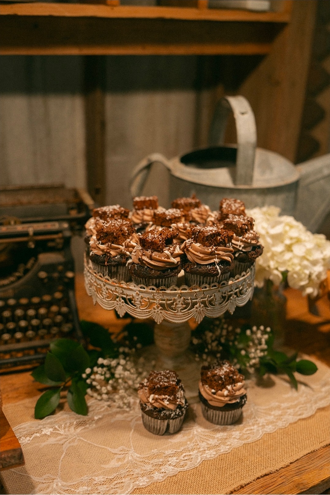 Chocolate cupcakes on a vintage cake stand