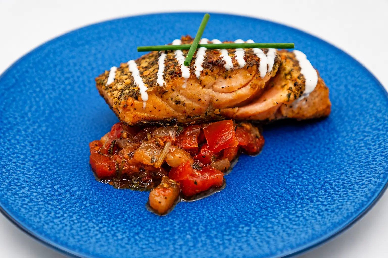Herb crusted salmon with tomato relish and tzatziki