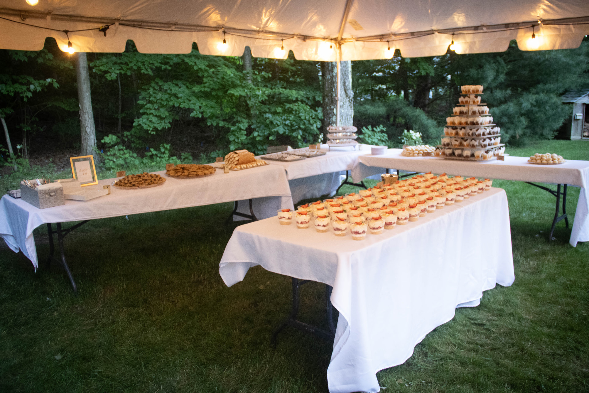 Tented dessert tables with cupcake tower and trifles